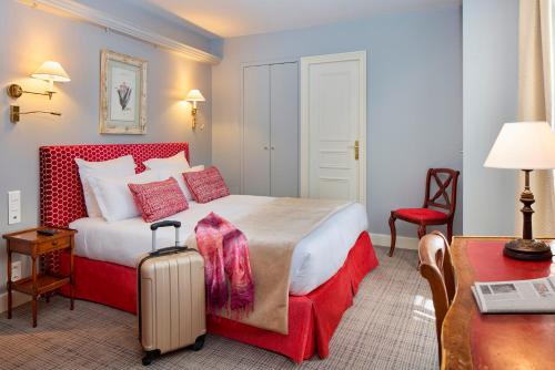 Habitación Doble Tradicional del hotel Le Relais Saint Honoré. Foto 3