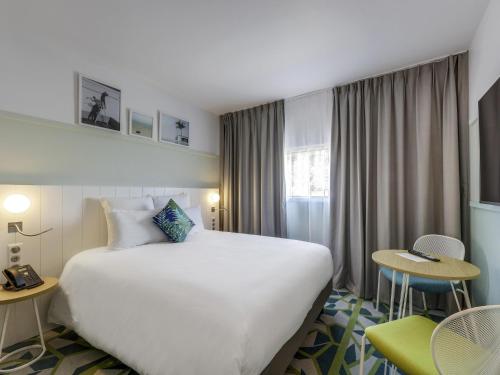Habitación Doble Estándar con litera del hotel Mercure Orly Airport. Foto 5
