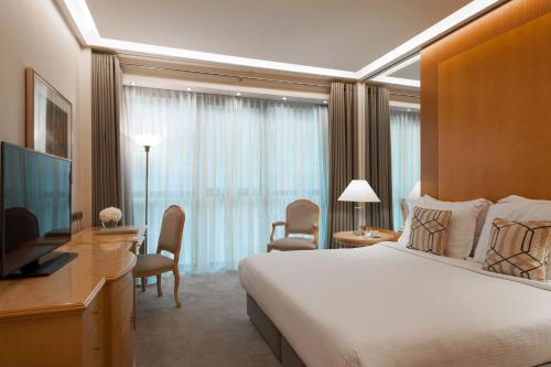 Interconnecting Supreme Room del hotel Melia Athens. Foto 1