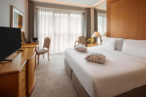 Family Connecting Supreme Room del hotel Melia Athens. Foto 15