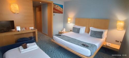 Habitación Triple del hotel Abitart. Foto 1