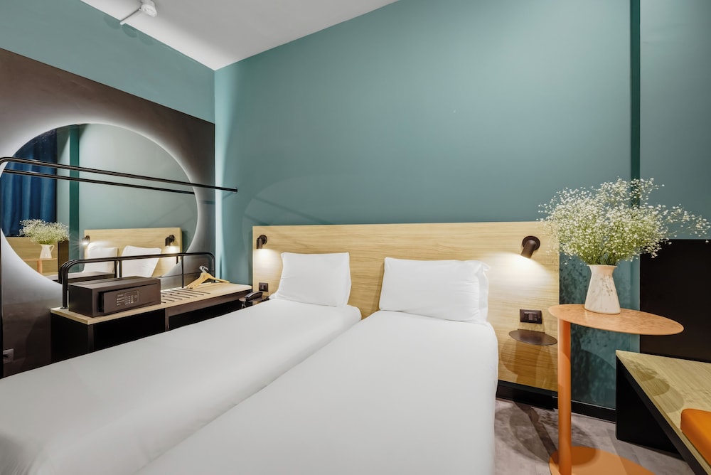 Habitación estándar con 2 camas individuales del hotel Ibis Styles Roma Aurelia. Foto 1