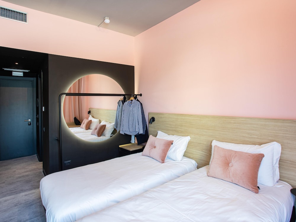 Habitación estándar con 2 camas individuales del hotel Ibis Styles Roma Aurelia. Foto 2