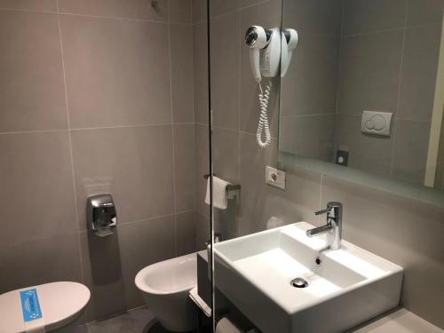Habitación Triple Superior del hotel Lugano Torretta. Foto 1