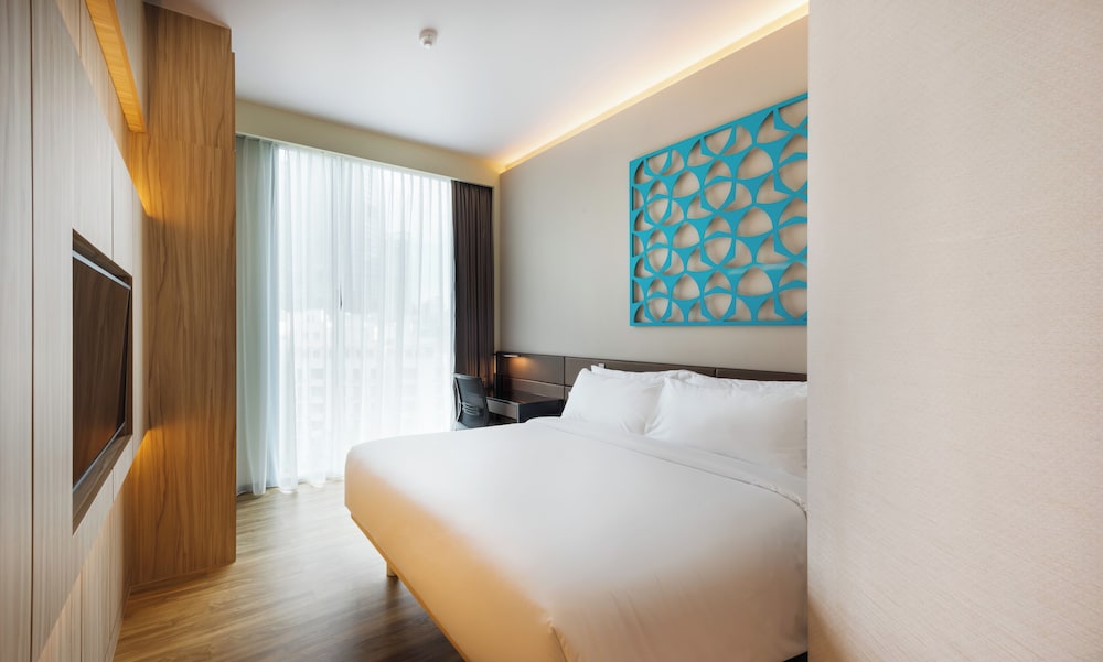 Habitación Deluxe con 1 cama doble del hotel Mercure Singapore On Stevens. Foto 6