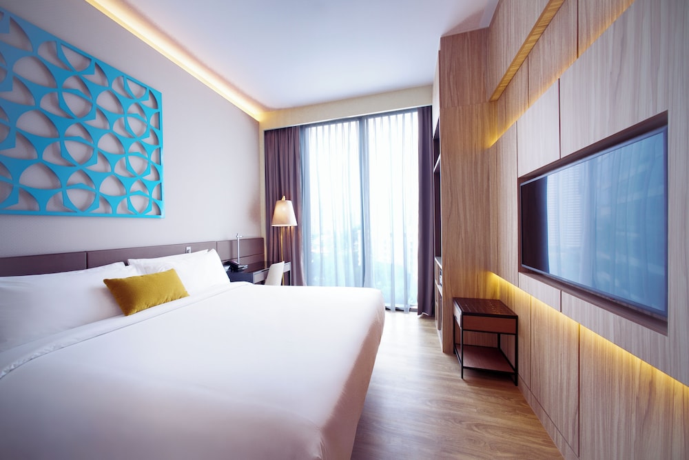 Habitación en Piso Privilegiado con 1 cama doble del hotel Mercure Singapore On Stevens. Foto 1