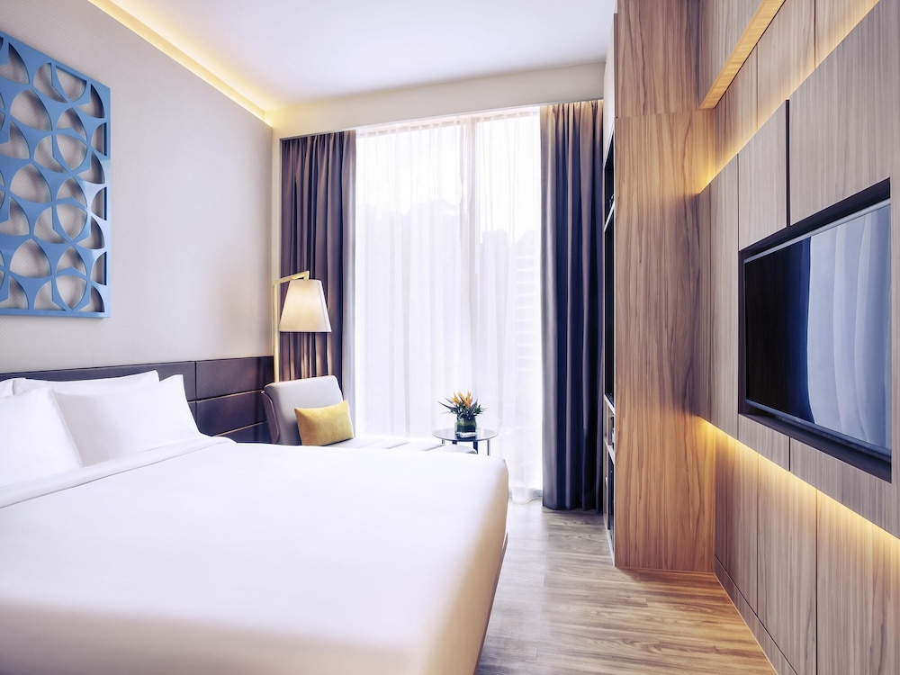 Habitación en Piso Privilegiado con 1 cama doble del hotel Mercure Singapore On Stevens. Foto 8