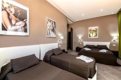 Habitación Familiar del hotel Rome Kings Suite. Foto 1