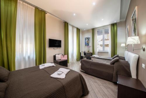 Habitación Familiar del hotel Rome Kings Suite. Foto 2