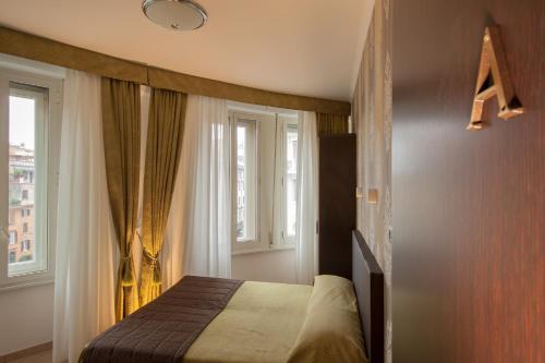 2 habitaciones comunicadas del hotel Rome Kings Suite. Foto 3
