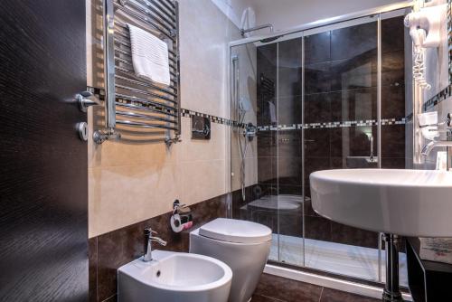 Habitación cuádruple del hotel Rome Kings Suite. Foto 1