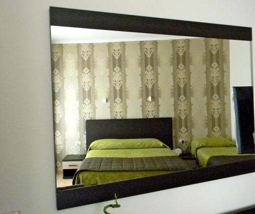 Habitación cuádruple del hotel Rome Kings Suite. Foto 5