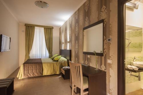 Habitación cuádruple del hotel Rome Kings Suite. Foto 6