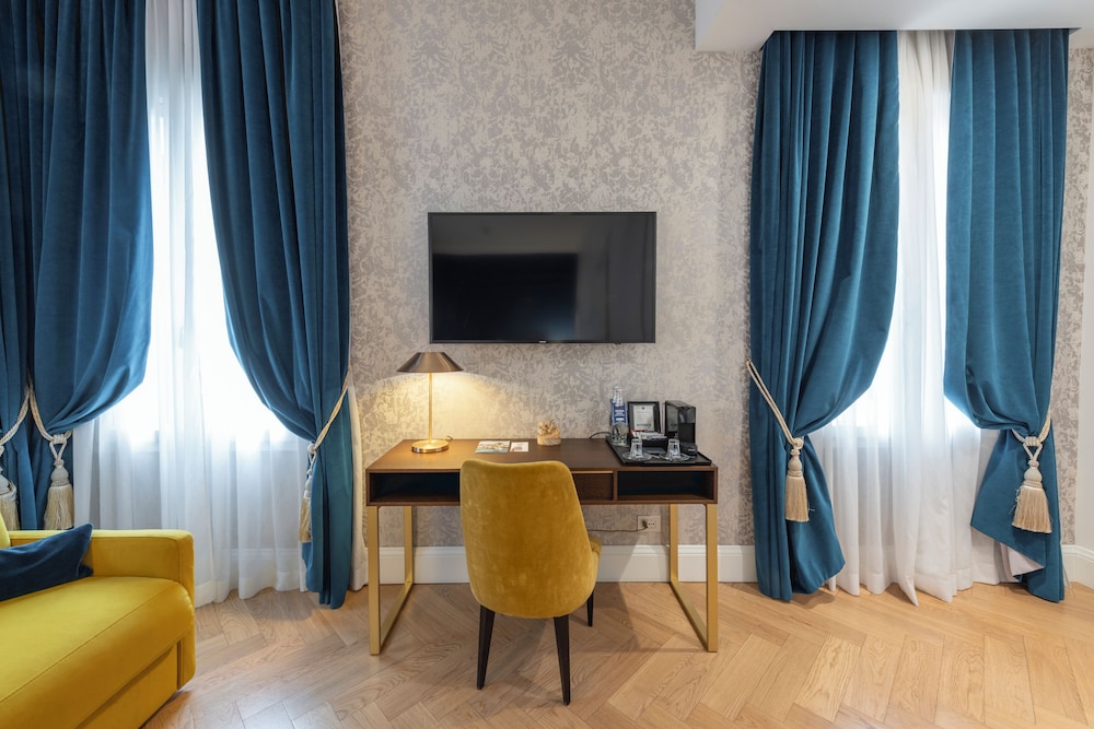 Habitación Deluxe del hotel H10 Palazzo Canova. Foto 4