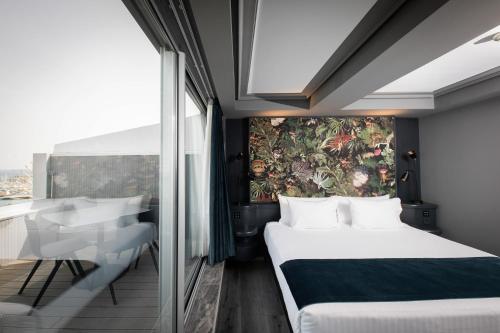 Habitación Doble Deluxe con terraza y vistas al mar - 1 o 2 camas del hotel Silken Saaj Las Palmas. Foto 3