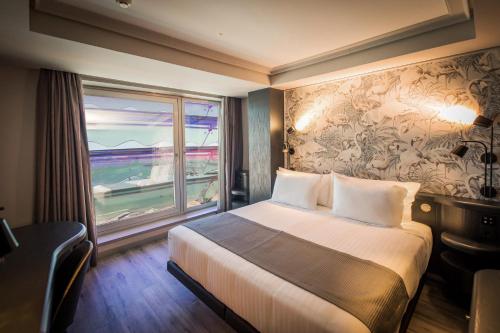 Habitación Doble Estándar con vistas al mar - 1 o 2 camas del hotel Silken Saaj Las Palmas. Foto 1