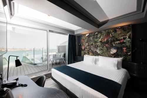 Habitación Doble Deluxe con terraza y vistas al mar - 1 o 2 camas del hotel Silken Saaj Las Palmas