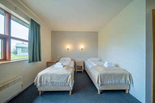 Habitación Doble Estándar - 2 camas del hotel Adventure Geirland. Foto 4