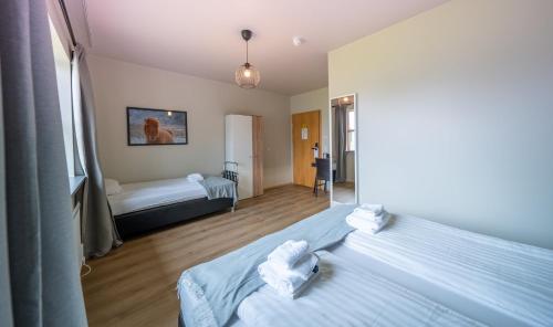 Habitación Triple del hotel Adventure Geirland. Foto 4