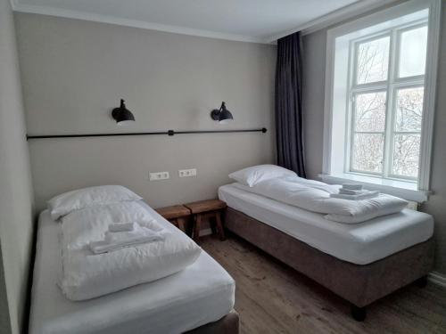 Habitación Doble - 2 camas del hotel Lake Gistihusid Egilsstadir. Foto 1