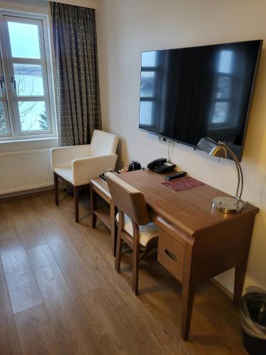 Habitación Doble con vistas al lago del hotel Lake Gistihusid Egilsstadir. Foto 3