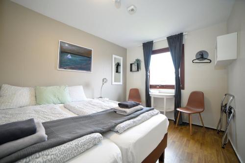 Habitación Doble Economy con 1 cama doble o 2 individuales y baño privado del hotel Klausturhof Guesthouse. Foto 1