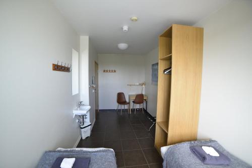 Habitación doble Baño compartido 2 Camas individuales del hotel Klausturhof Guesthouse. Foto 1