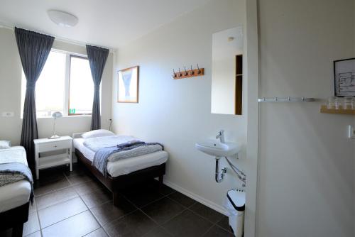 Habitación doble Baño compartido 2 Camas individuales del hotel Klausturhof Guesthouse. Foto 7