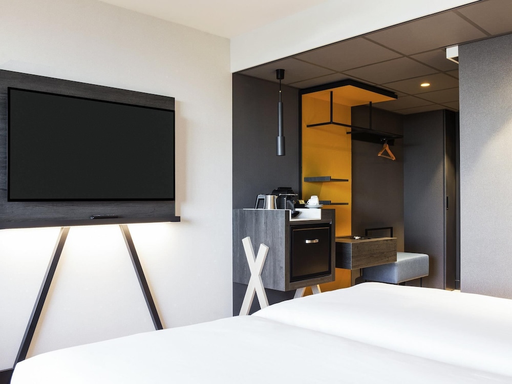 Habitación con 2 camas individuales, varias camas (Privilege) del hotel Mercure Amsterdam City. Foto 5
