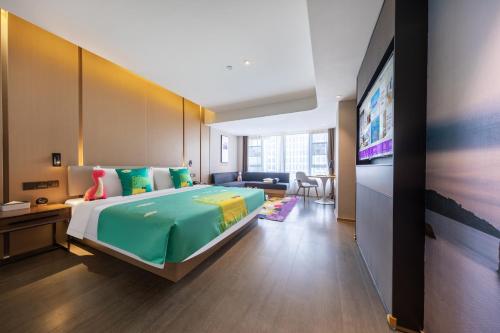Parent - Child Style King Room del hotel Mercure Zhuhai Xiangzhou Coast. Foto 1