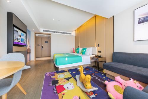 Parent - Child Style King Room del hotel Mercure Zhuhai Xiangzhou Coast. Foto 2