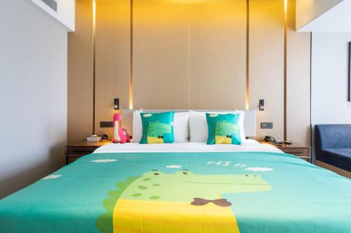 Parent - Child Style King Room del hotel Mercure Zhuhai Xiangzhou Coast. Foto 4