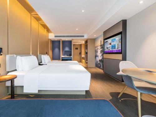 Habitación Doble Superior - 2 camas del hotel Mercure Zhuhai Xiangzhou Coast. Foto 1