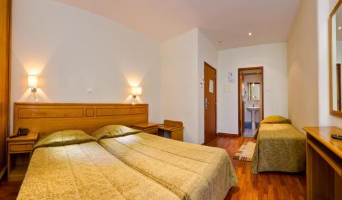 Habitación Triple del hotel Avenida Park. Foto 1