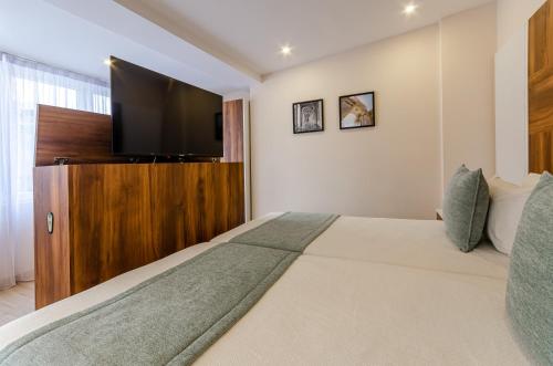 Habitación Triple Superior del hotel Avenida Park. Foto 4