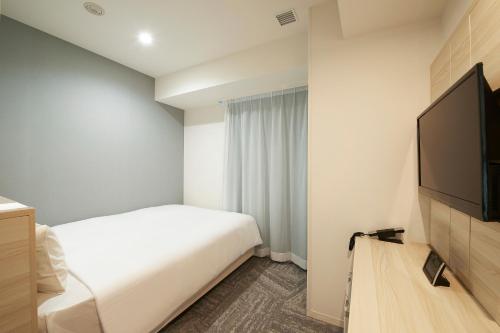 Habitación Doble esquinera - No fumadores del hotel Sotetsu Fresa Inn Ueno Okachimachi. Foto 2