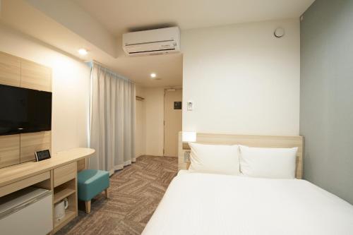 Habitación Doble esquinera - No fumadores del hotel Sotetsu Fresa Inn Ueno Okachimachi. Foto 3