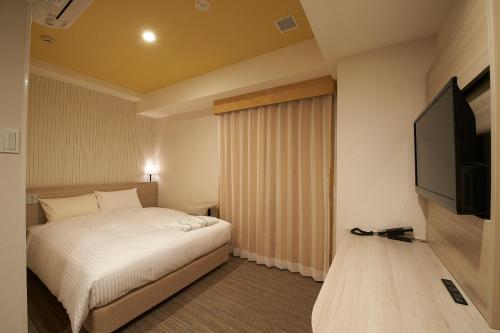 Habitación Doble Confort para no fumadores del hotel Sotetsu Fresa Inn Ginza Sanchome. Foto 2