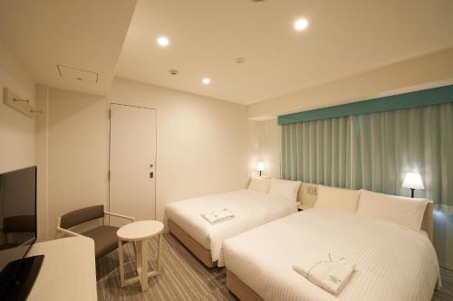 Habitación Doble - No fumadores - 2 camas del hotel Sotetsu Fresa Inn Ginza Sanchome