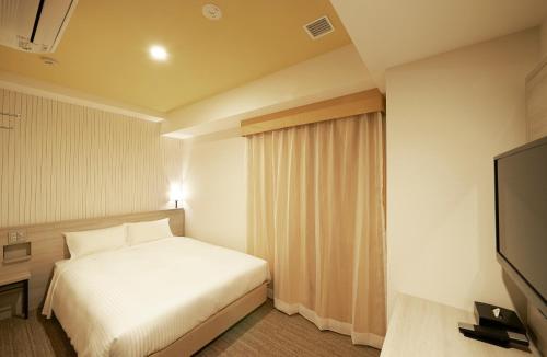 Habitaciones comunicadas - No fumadores del hotel Sotetsu Fresa Inn Ginza Sanchome. Foto 3