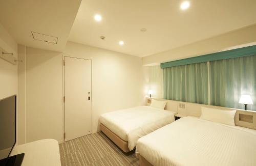 Habitaciones comunicadas - No fumadores del hotel Sotetsu Fresa Inn Ginza Sanchome. Foto 4