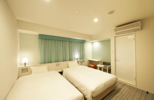 Habitaciones comunicadas - No fumadores del hotel Sotetsu Fresa Inn Ginza Sanchome. Foto 5