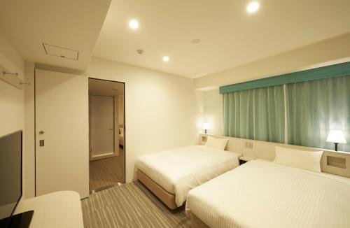 Habitaciones comunicadas - No fumadores del hotel Sotetsu Fresa Inn Ginza Sanchome. Foto 8
