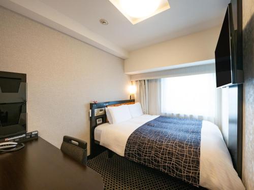Habitación Doble - No fumadores del hotel Apa and Resort Nishishinjuku Gochome Eki Tower. Foto 1