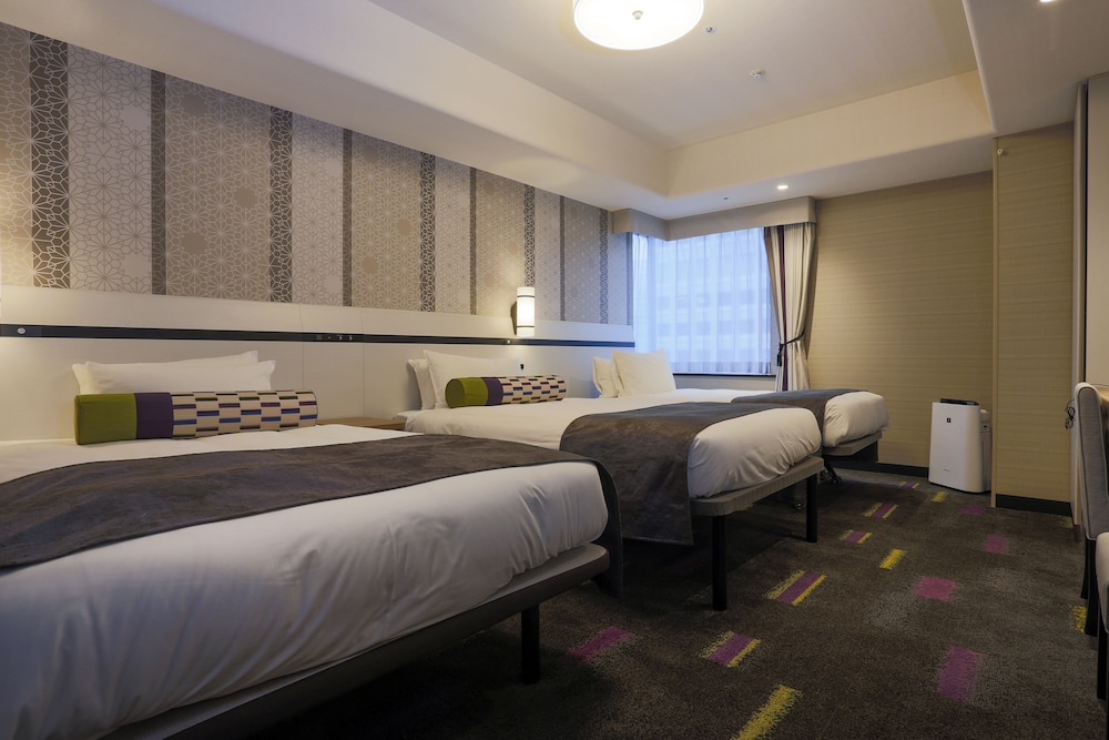 Habitación con 2 camas individuales, no fumadores, en esquina (with Extra Bed) del hotel Monterey Le Frere Osaka. Foto 4