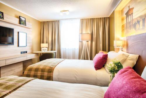 Habitación Doble Estándar - 2 camas del hotel Leonardo Royal Edinburgh Haymarket. Foto 4