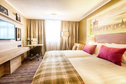 Alojamiento Doble Executive con sofá del hotel Leonardo Royal Edinburgh Haymarket. Foto 2