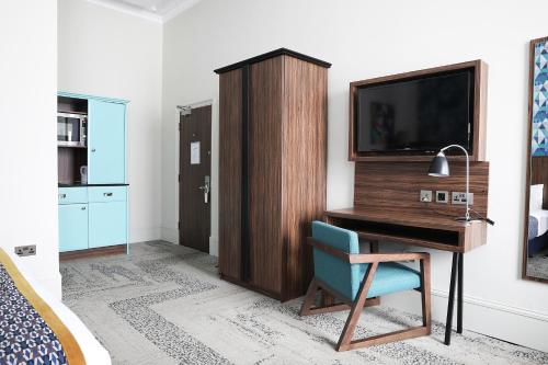 Estudio Cama Litera 1 Cama king kitchenette del hotel Cairn. Foto 4