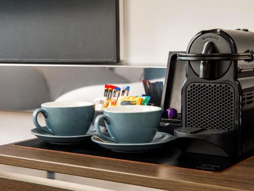 Executive Premium Queen Room with One Queen Bed and One Double Sofa Bed del hotel Novotel London Bridge. Foto 10