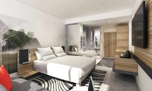 Habitación Superior Queen con sofá del hotel Novotel London Waterloo. Foto 7